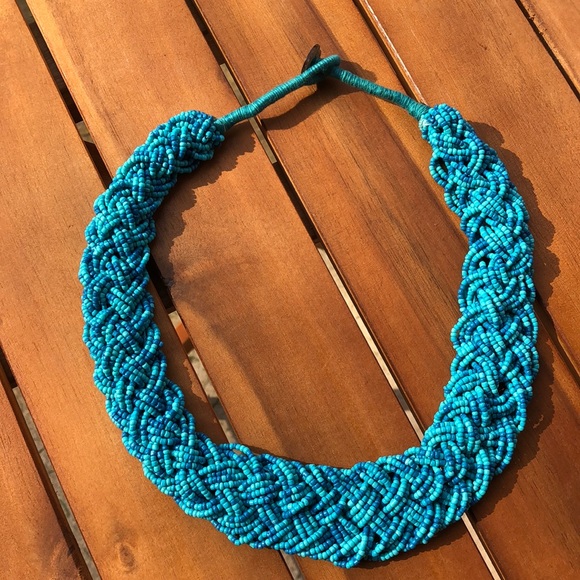 Jewelry - Blue beaded necklace with button clasp